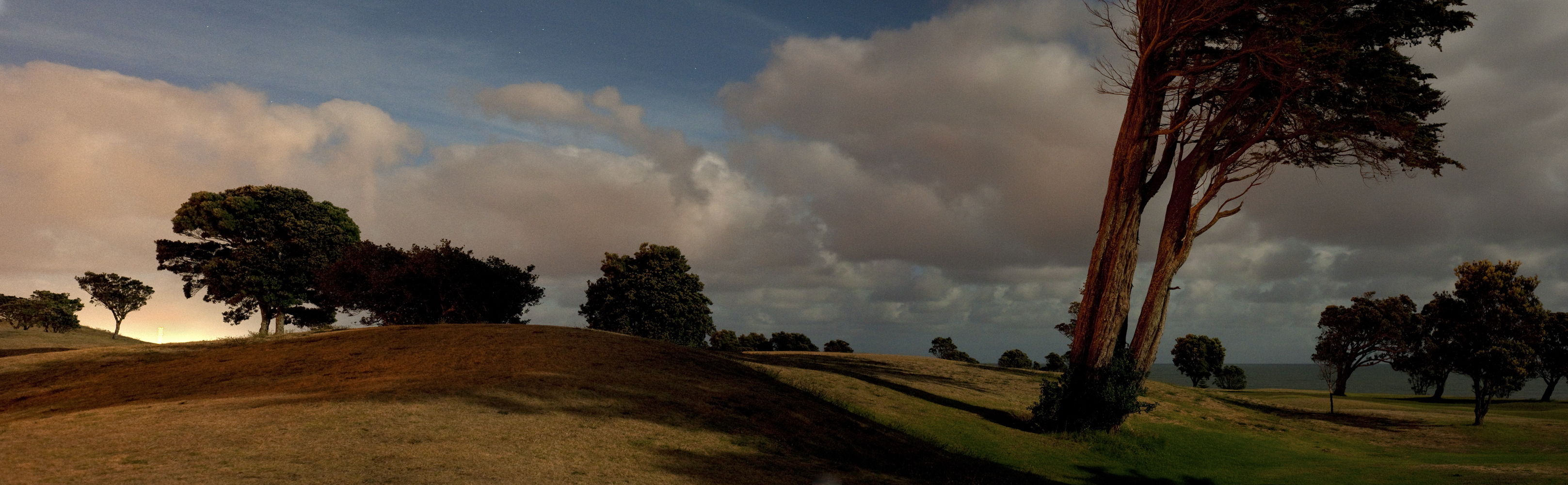 The golf course after dark – pano